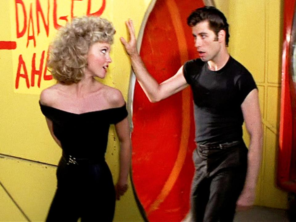 Olivia Newton-John as Sandy and John Travolta as Danny Zuko