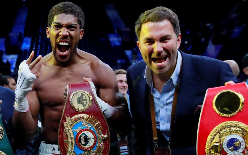 Promoter Eddie Hearn and Anthony Joshua celebrate - ACTION IMAGES