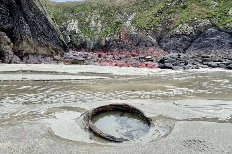 Objects long buried have reappeared on a Welsh beach