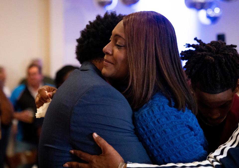 Evansville Mayoral-elect Stephanie Terry hugs her husband after the final results come in during a democratic election watch party at City View at Sterling Square in Evansville, Ind., Tuesday, Nov. 7, 2023.