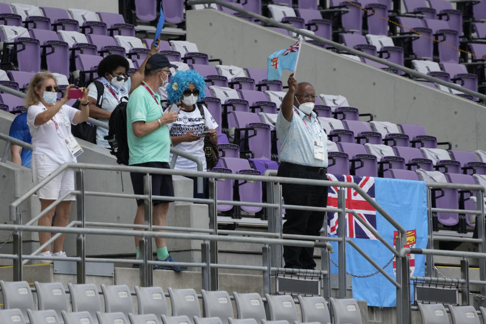 Fiji fans cheer following Fiji's win over Argentina in their men's rugby sevens semifinal match at the 2020 Summer Olympics, Wednesday, July 28, 2021 in Tokyo, Japan. (AP Photo/Shuji Kajiyama)