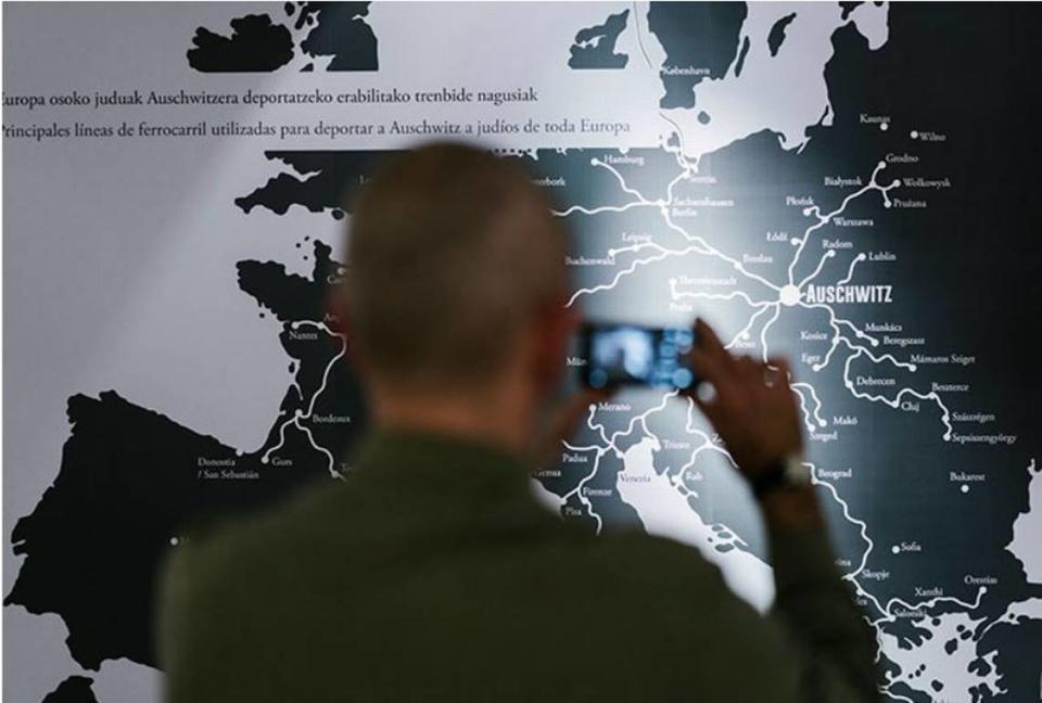 Photo of a wall display from the “Seeing Auschwitz” exhibit, which makes its U.S. debut in Charlotte in February.