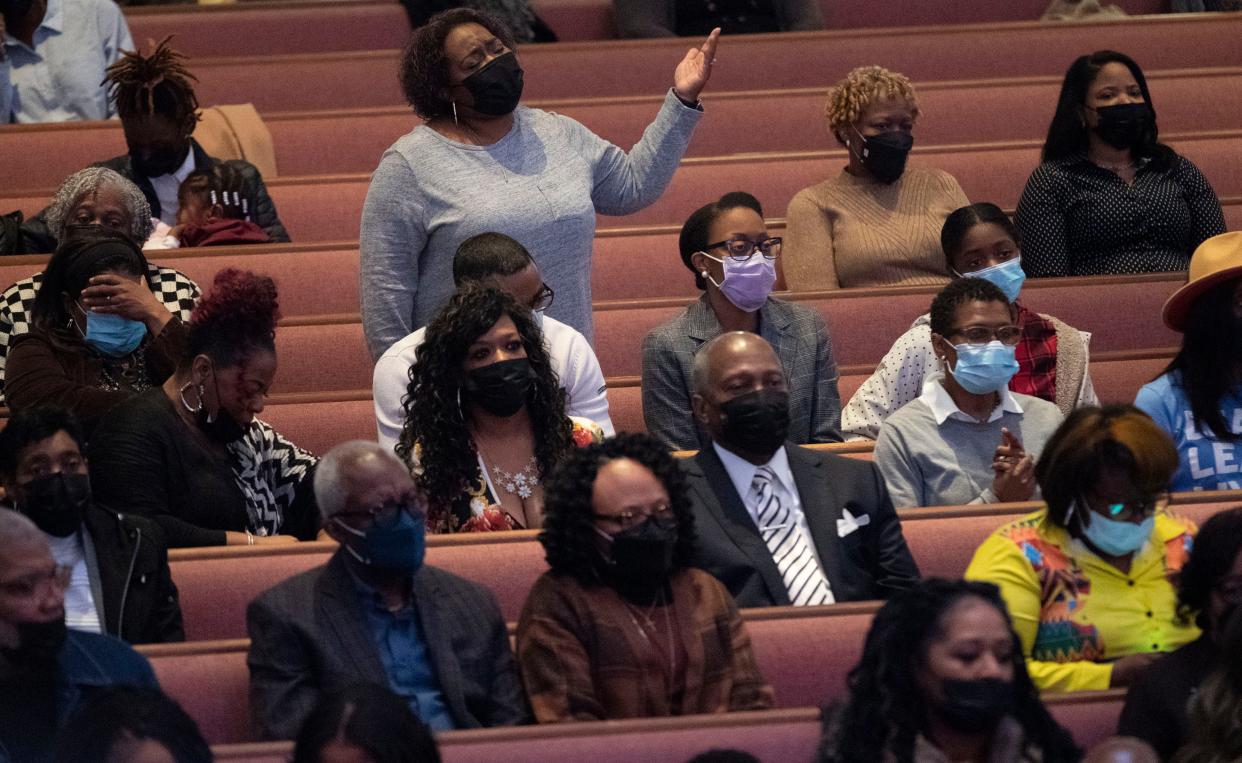 Church members raise their hands in praise during a worship service at Mississippi Blvd. Christian Church  Sunday, Jan. 29, 2023 in Memphis, Tenn. The church will hold the Tyre Nichols funeral service at the church on Wednesday. 