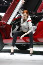 A model poses with the Italdesign Giugiaro Parcour at the 2013 Geneva Motor Show.