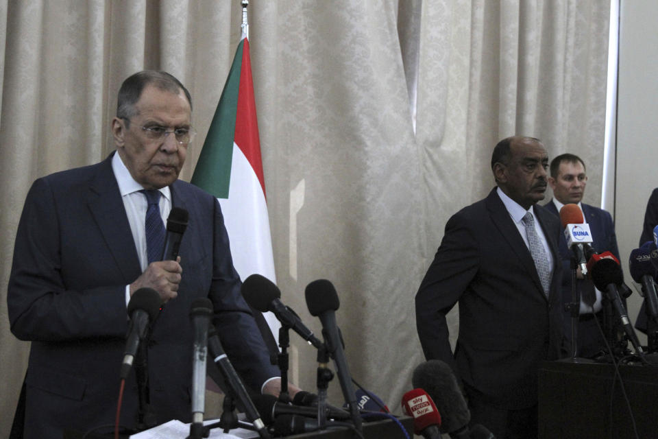 Russian Foreign Minister Sergei Lavrov, left, and Sudanese acting foreign minister Ali al-Sadiq give a joint press conference at the airport in Khartoum, Sudan, Thursday, Feb. 9, 2023. (AP Photo/Marwan Ali)