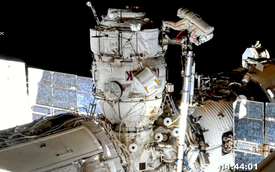 Russian cosmonauts Oleg Novitsky, top, and Pyotr Dubrov, bottom, members of the crew to the International Space Station (ISS), perform their first spacewalk on Wednesday, June 2, 2021, to replace old batteries outside the International Space Station - Russia Space Station 