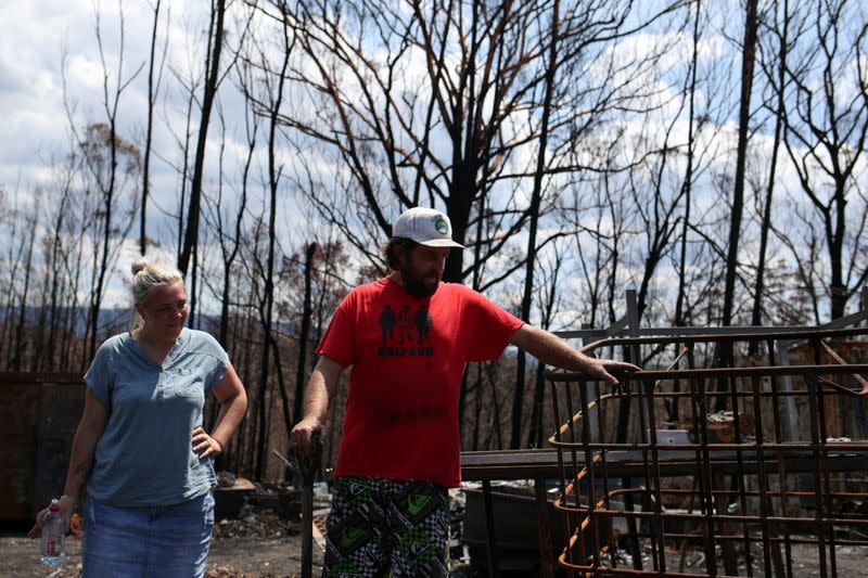 Residents return to their property following the recent bushfires in Conjola Park