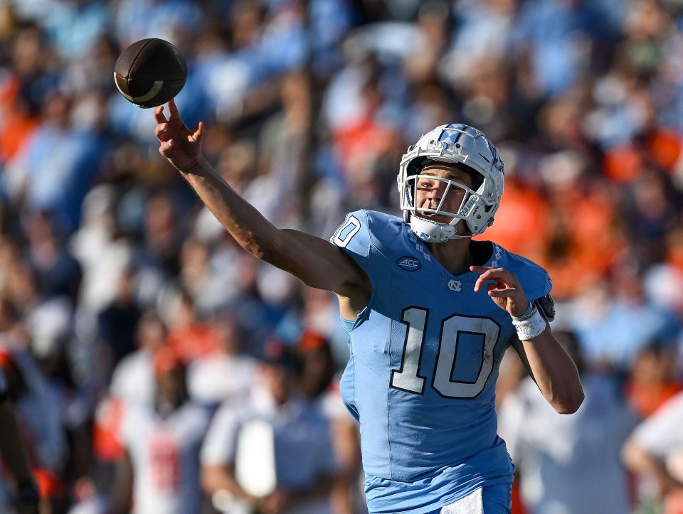 CHAPEL HILL, NORTH CAROLINA - OCTOBER 07: Drake Maye #10 of the North Carolina Tar Heels looks to pass against the Syracuse Orange during the first half of their game at Kenan Memorial Stadium on October 07, 2023 in Chapel Hill, North Carolina. (Photo by Grant Halverson/Getty Images)