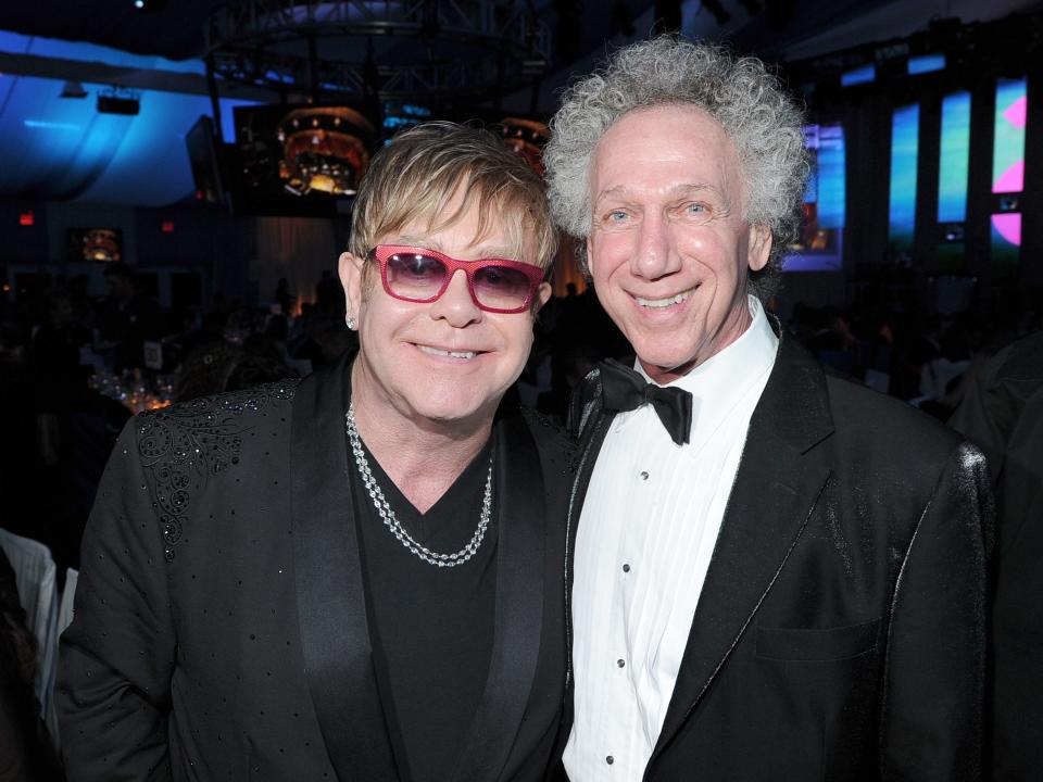 Elton John and photographer Bob Gruen at the 20th Annual Elton John AIDS Foundation Academy Awards Viewing in 2012.