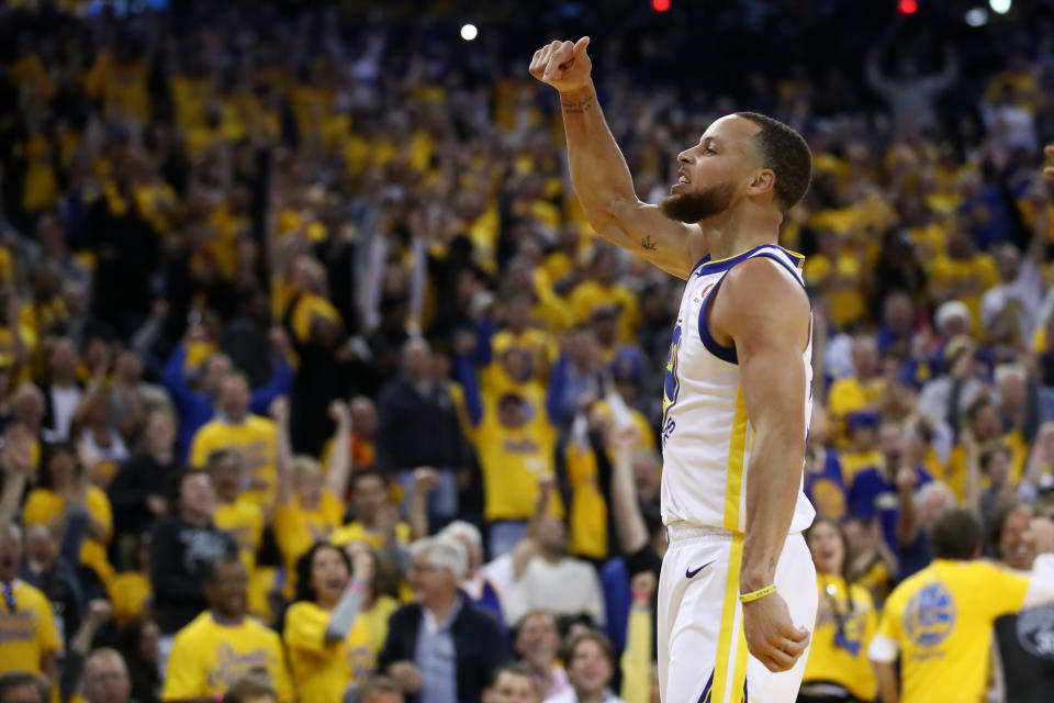 Stephen Curry reminds everyone in Oracle Arena whose house it is during Game 3 on Sunday night. (AP)