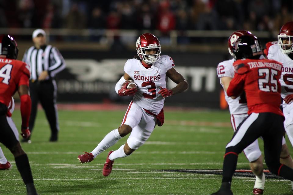 OU's Jalil Farooq runs the ball against Texas Tech during a game this past season at Jones AT&T Stadium in Lubbock, Texas.