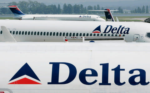 Delta capping fees for people fleeing Maria - Credit: Larry Downing/Reuters