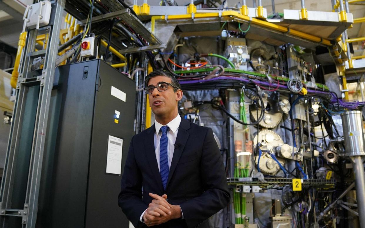 Britain's Prime Minister Rishi Sunak speaks as he gives a television broadcast interview during a visit to the UK Atomic Energy Authority, Culham Science Centre near Oxford, west of London, on March 30, 2023. (Photo by Jacob King / POOL / AFP) (Photo by JACOB KING/POOL/AFP via Getty Images) - JACOB KING/AFP