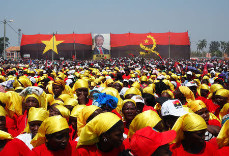 Supporters listen as Joao Lourenco, presidential candidate for the ruling MPLA party, speaks at an election rally in Malanje, Angola, August 17, 2017. REUTERS/Stephen Eisenhammer