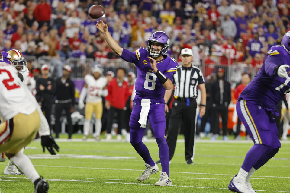 Minnesota Vikings quarterback Kirk Cousins (8) throws a pass during the second half of an NFL football game against the San Francisco 49ers, Monday, Oct. 23, 2023, in Minneapolis. (AP Photo/Bruce Kluckhohn)