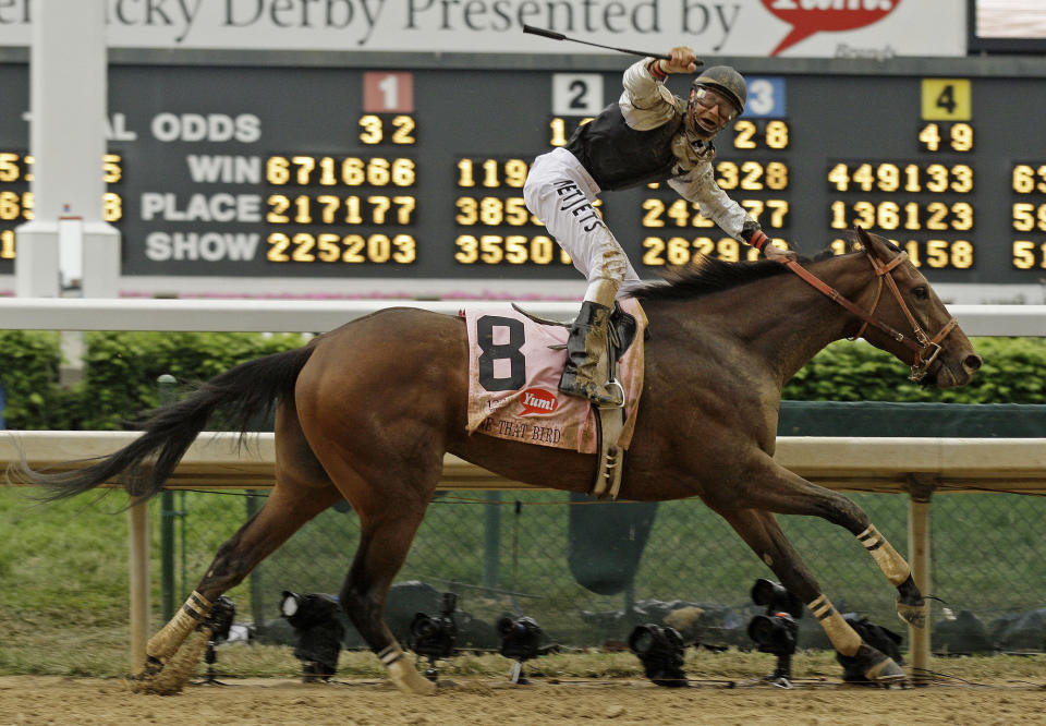 FILE - Calvin Borel rides Mine That Bird to a victory in the 135th Kentucky Derby horse race at Churchill Downs Saturday, May 2, 2009, in Louisville, Ky. Mine That Bird accelerated through the slop to score a 6 3/4-length victory in the second-biggest upset at the time in Derby history. (AP Photo/Rob Carr, File)