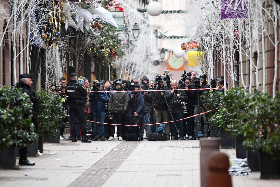 Media gather near the Christmas Market where a deadly shooting took place, in Strasbourg, France, Dec. 12, 2018. (Photo: Patrick Seeger/EPA-EFE/REX/Shutterstock)