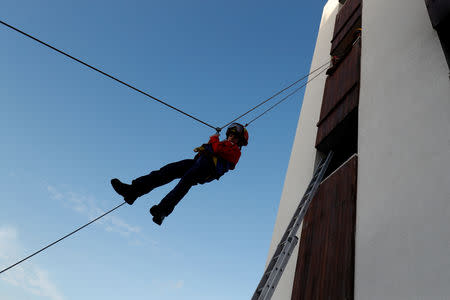 Members of firefighter school attend a training session in Oliveira do Hospital, Portugal November 10, 2018. Picture taken November 10, 2018. REUTERS/Rafael Marchante