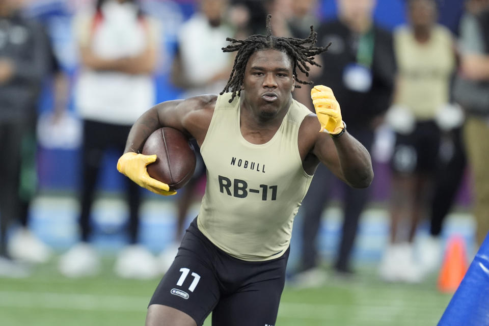 FILE - Southern Mississippi running back Frank Gore Jr. runs a drill at the NFL football scouting combine, Saturday, March 2, 2024, in Indianapolis. “Being a son of an NFL player, you have to mature a lot faster than a normal kid,” Gore Jr. said.(AP Photo/Darron Cummings)