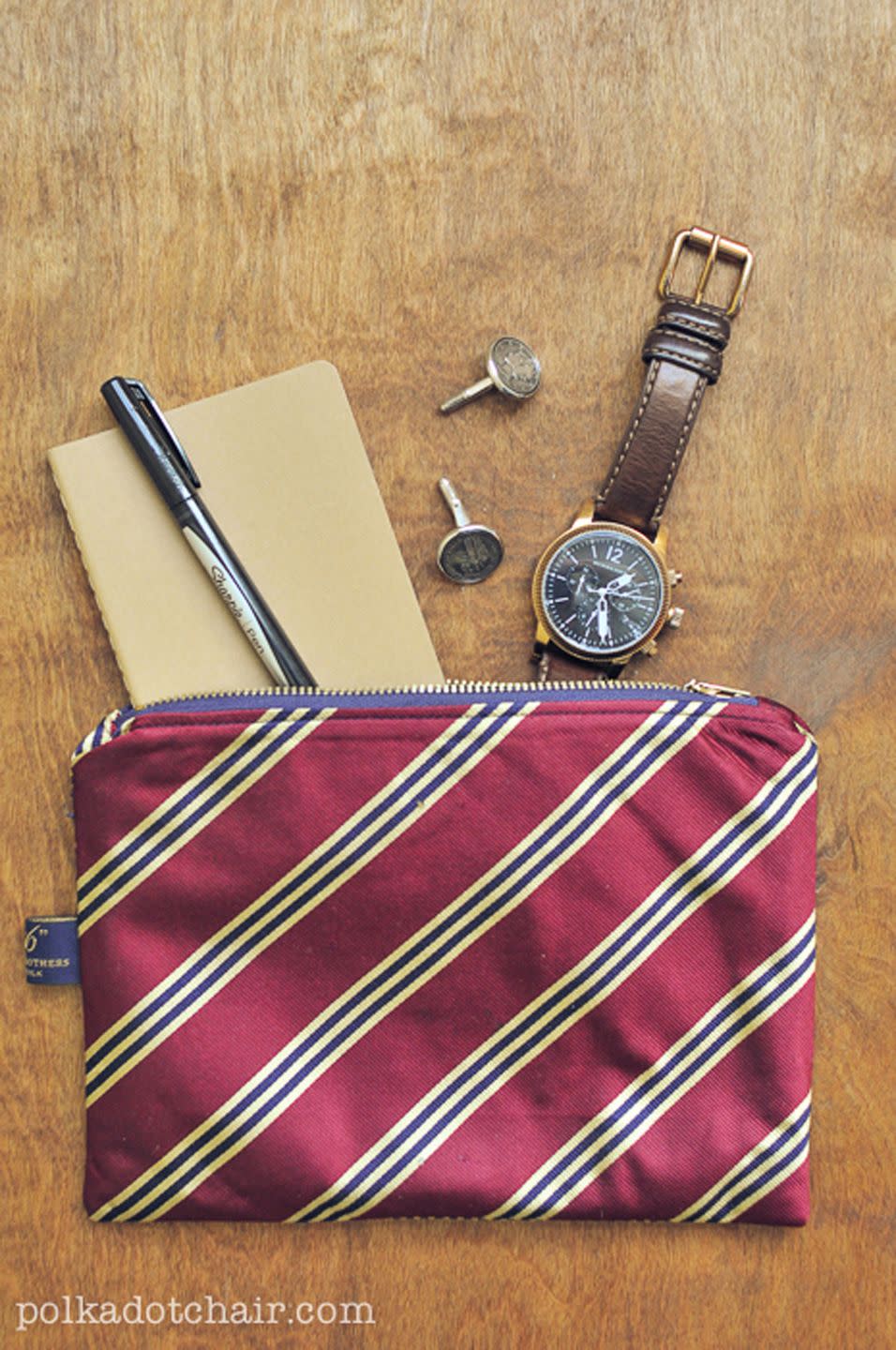 <p>Transform a couple of Dad's old ties into a pouch that can hold all of his odds and ends. It's also nicely sized to act as a toiletry case if he frequently travels. </p><p><strong>Get the tutorial at <a href="https://www.polkadotchair.com/diy-necktie-zip-pouch/" rel="nofollow noopener" target="_blank" data-ylk="slk:Polkadot Chair;elm:context_link;itc:0;sec:content-canvas" class="link ">Polkadot Chair</a>.</strong></p><p><strong><a class="link " href="https://www.amazon.com/Coats-Thread-Zippers-F2107-013-All-Purpose/dp/B003W0S58Y?tag=syn-yahoo-20&ascsubtag=%5Bartid%7C10050.g.1171%5Bsrc%7Cyahoo-us" rel="nofollow noopener" target="_blank" data-ylk="slk:Shop Now;elm:context_link;itc:0;sec:content-canvas">Shop Now</a></strong></p>