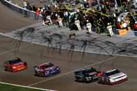 LAS VEGAS, NV - MARCH 10: Brad Keselowski, driver of the #22 Discount Tire Dodge, leads a pack of cars off pit road during the NASCAR Nationwide Series Sam's Town 300 at Las Vegas Motor Speedway on March 10, 2012 in Las Vegas, Nevada. (Photo by Ronald Martinez/Getty Images for NASCAR)