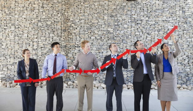 Business people forming upward arrow