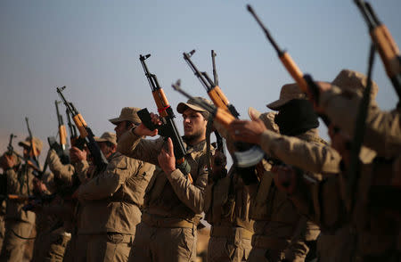 Iraqi fighters from Hashid Shaabi take part in a training at Makhmur camp in Iraq December 11, 2016. REUTERS/Mohammed Salem