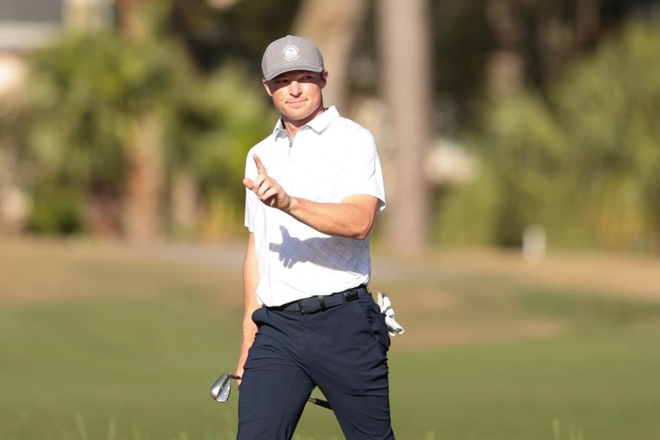 Frankie Capan III of the United States waves to fans on the 18th green during the third round of the Club Car Championship at The Landings Golf & Athletic Club on April 06, 2024 in Savannah, Georgia. (Photo by Andrew Wevers/Getty Images)