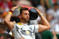 <p>A Germany fan looks on dejected following the 2018 FIFA World Cup Russia group F match between Germany and Mexico at Luzhniki Stadium on June 17, 2018 in Moscow, Russia. (Photo by Dan Mullan/Getty Images) </p>