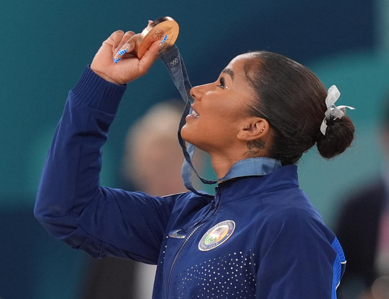 PARIS, FRANCE - AUGUST 5:  Jordan Chiles of Team Untied States celebrates after being awarded a bronze medal in the Women's Floor Exercise Final at Bercy Arena during the Paris 2024 Olympics on August 5, 2024. (Photo by Toni L. Sandys/The Washington Post via Getty Images)