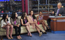 In this photo provided by CBS, from left, Kyla Ross, Jordyn Wieber, McKayla Maroney, Aly Raisman and Gabby Douglas, members of the United States women's Olympic gymnastics gold medal-winning team, join television show host David Letterman on the set of the “Late Show with David Letterman,” Tuesday, Aug. 14, 2012, in New York. (AP Photo/CBS, John Paul Filo) MANDATORY CREDIT; NO SALES; NO ARCHIVE; FOR NORTH AMERICAN USE ONLY