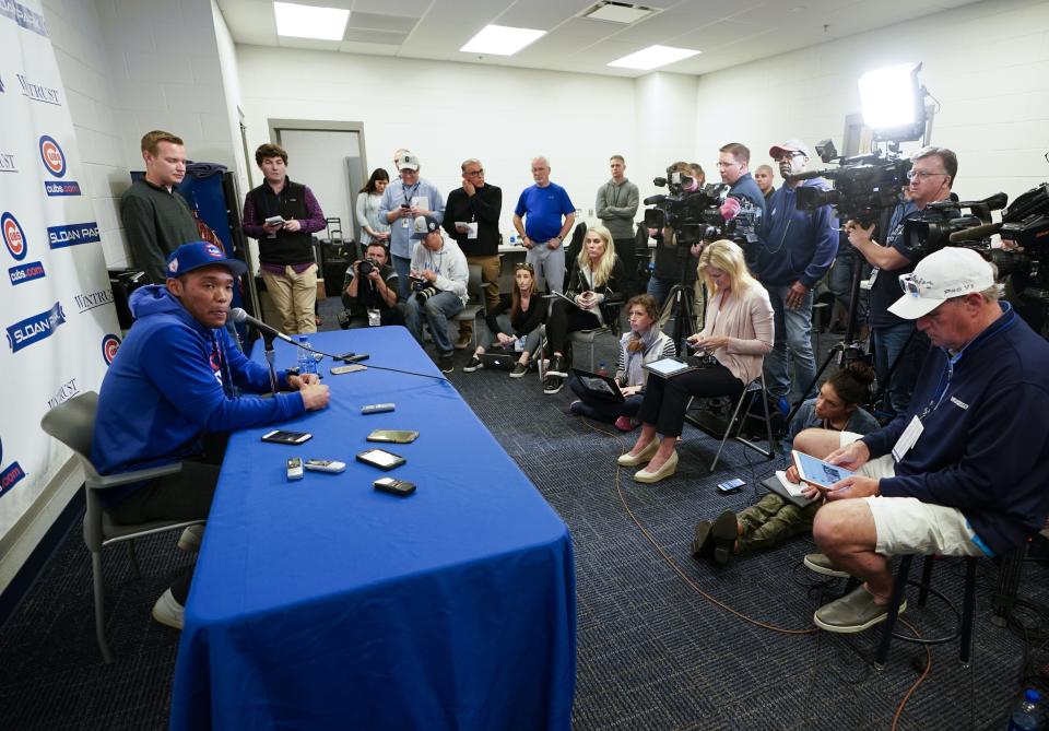 Chicago Cubs shortstop Addison Russell speaks at a press conference after a spring training baseball workout Friday, Feb. 15, 2019, in Mesa, Ariz. (AP Photo/Morry Gash)