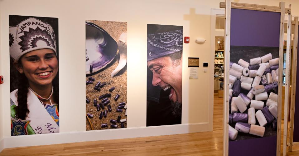 The faces of people, as well as the tools of wampum-making, are displayed on life-sized panels.