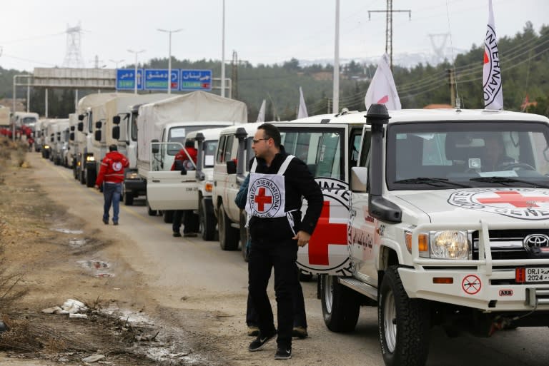 An International Committee of the Red Cross convoy heads to the besieged Syrian town of Madaya, on January 11, 2016, to deliver food to starving communities