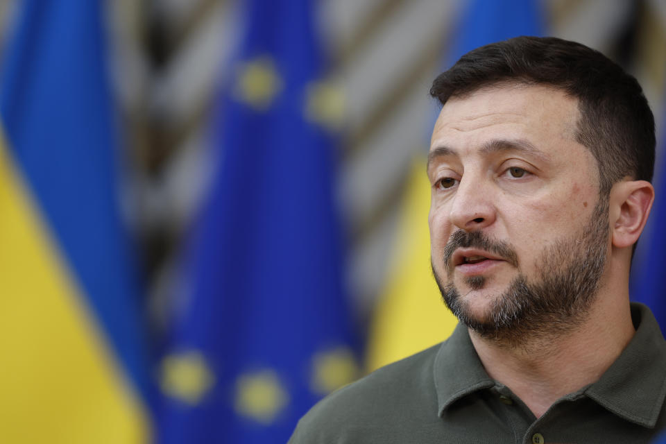 Ukraine's President Volodymyr Zelenskyy speaks with the media as he arrives for an EU summit in Brussels, Thursday, June 27, 2024. European Union leaders are expected on Thursday to discuss the next EU top jobs, as well as the situation in the Middle East and Ukraine, security and defence and EU competitiveness. (AP Photo/Geert Vanden Wijngaert)