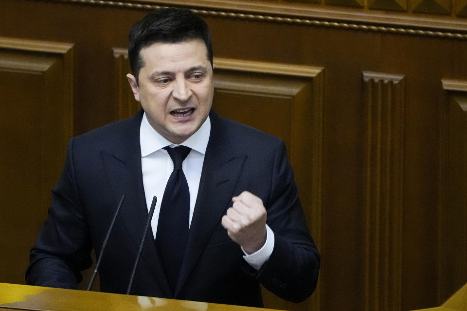 Ukrainian President Volodymyr Zelenskyy gestures as he addresses lawmakers in Kyiv, Ukraine, Wednesday, Dec.1, 2021. Ukraine marks the 30th anniversary of the referendum on independence. (AP Photo/Efrem Lukatsky)