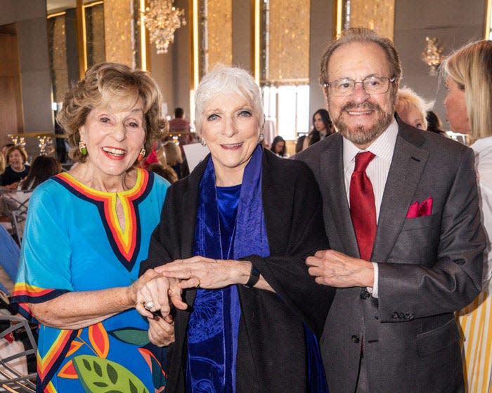 Judy Collins, center, with Fran and Barry Weissler at the Spirit of Achievement Awards Luncheon.