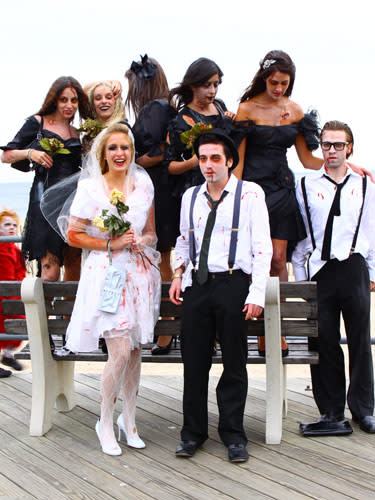 <div class="caption-credit"> Photo by: Linda Chasey via Flickr</div>This bridal party takes on a deadly theme and executes it with all-black bridesmaid dresses adorned with rips and blood stains. We're assuming the reception was <i>killer</i>!