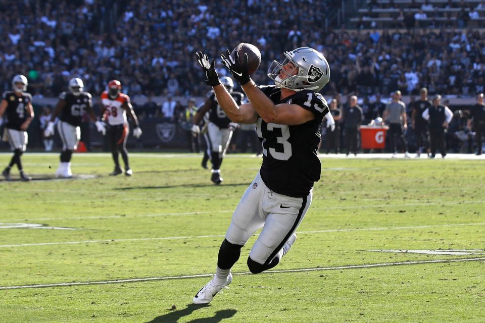 Nov 17, 2019; Oakland, CA, USA; Oakland Raiders wide receiver Hunter Renfrow (13) catches a pass for a first down during the second quarter against the Cincinnati Bengals at Oakland Coliseum.