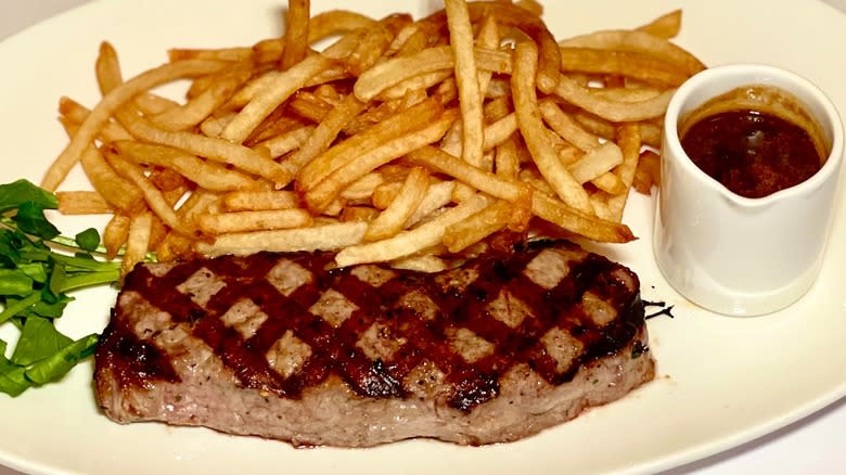 steak and fries with au poivre sauce