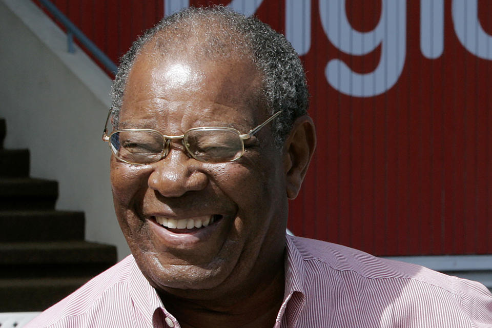 FILE - In this April 5, 2008, file photo, former West Indies' cricket players Sir Everton Weekes, attends a ceremony honoring Frank Worrell before the third day of the second cricket test match between the West Indies and Sri Lanka at the Queen's Park Oval in Port-of-Spain, Trinidad. Weekes, who formed one of the famous three "Ws" of West Indian cricket as part of a formidable batting lineup for more than a decade, has died. He was 95. West Indies Cricket said Weekes died Wednesday, July 1, 2020. (AP Photo/Lynne Sladky, File)