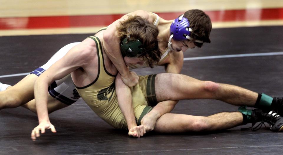 Tyler Delcollo of Delaware Military pinned James Holmes of Saint Mark's in the 120-pound match of the DIAA Division II team wrestling championship.