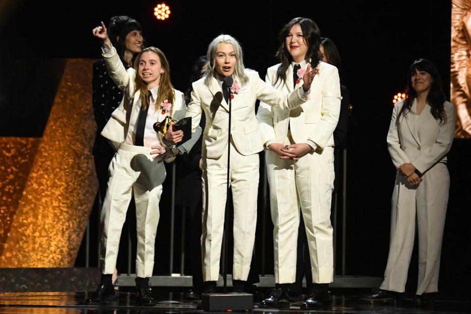 Boygenius accepting their award for Best Alternative Music Album (AFP via Getty Images)