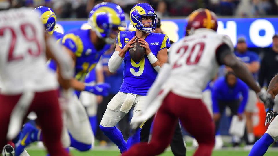 Los Angeles Rams quarterback Matthew Stafford drops back to pass against the Washington Commanders. - Gary A. Vasquez/USA TODAY Sports/Reuters