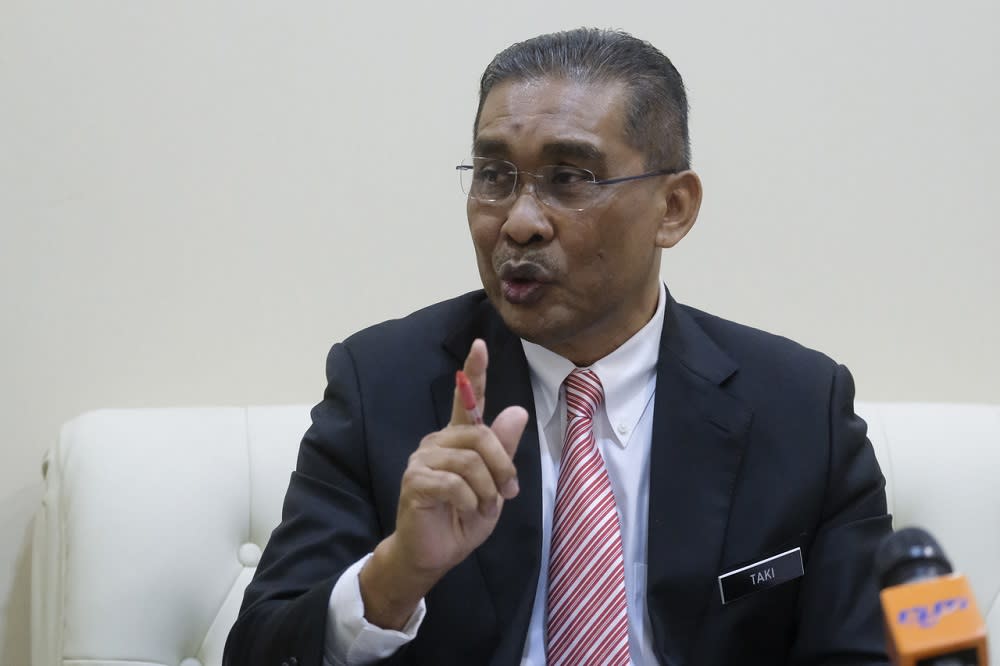 Minister in charge of parliament and law Datuk Takiyuddin Hassan speaks during a press conference in Putrajaya May 8, 2020. — Bernama pic