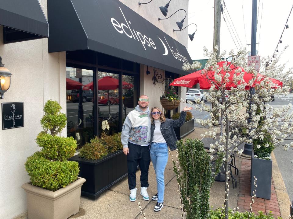 M.J. and Kerri Klingensmith of Kennett Square, Pennsylvania drove to Wilmington's Eclipse Bistro to witness Monday's solar eclipse on the restaurant's patio.