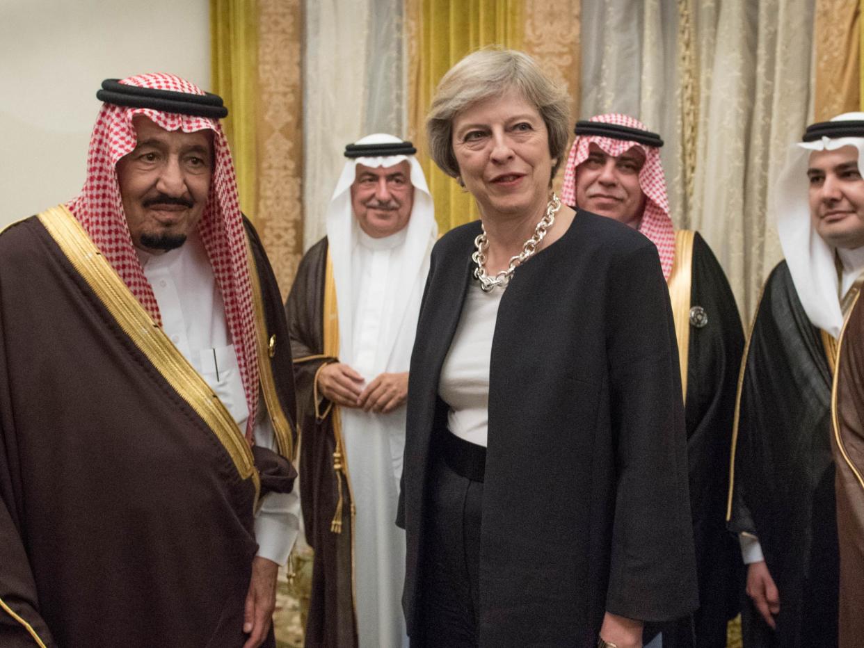 Theresa May with King Salman (left) during a visit to Saudi Arabia in April: Getty