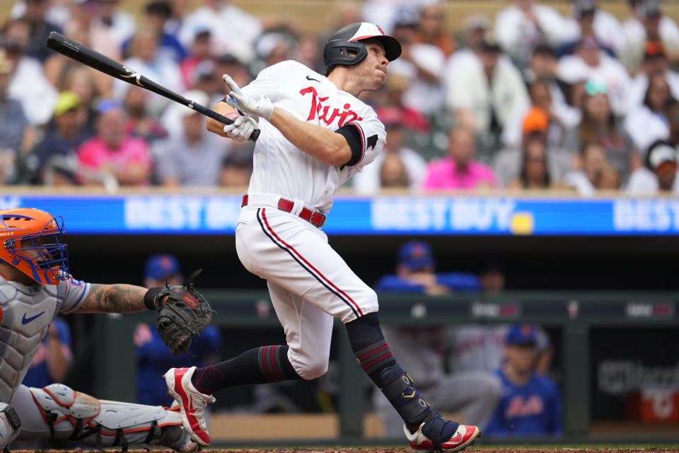 Minnesota Twins' Max Kepler watches his three-run triple during the seventh inning of a baseball game against the New York Mets, Saturday, Sept. 9, 2023, in Minneapolis. (AP Photo/Abbie Parr)