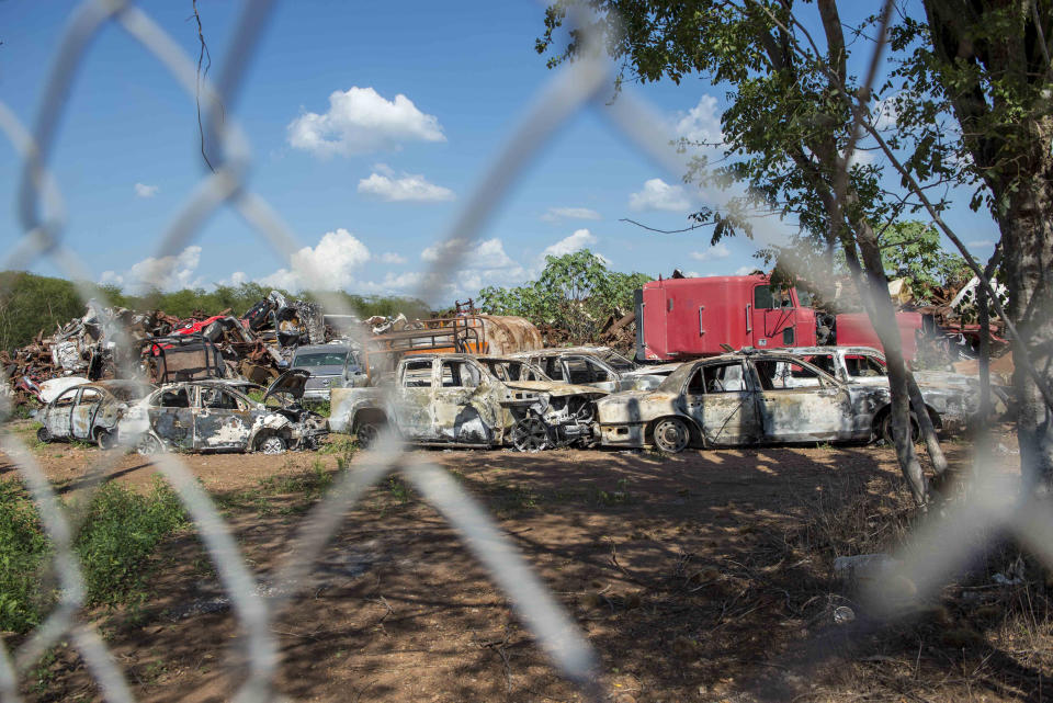 Charred vehicles riddled with bullets from a recent shootout sit at the attorney general's evidence lot in Culiacan, Mexico, Saturday, Oct. 26, 2019. The physical scars of the Oct. 17 gunbattles _ what’s come to be known as “black Thursday” by residents of Culiacan, the capital of Sinaloa and a stronghold of the Sinaloa cartel long led by Joaquín “El Chapo” Guzmán _ are beginning to heal, but residents are still coming to grips with the worst cartel violence in recent memory. (AP Photo/Augusto Zurita)