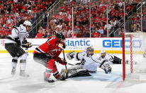 NEWARK, NJ - JUNE 02: Zach Parise #9 of the New Jersey Devils goes for the puck in front of Jonathan Quick #32 of the Los Angeles Kings as Anze Kopitar #11 and Mike Richards #10 look on during Game Two of the 2012 NHL Stanley Cup Final at the Prudential Center on June 2, 2012 in Newark, New Jersey. (Photo by Bruce Bennett/Getty Images)